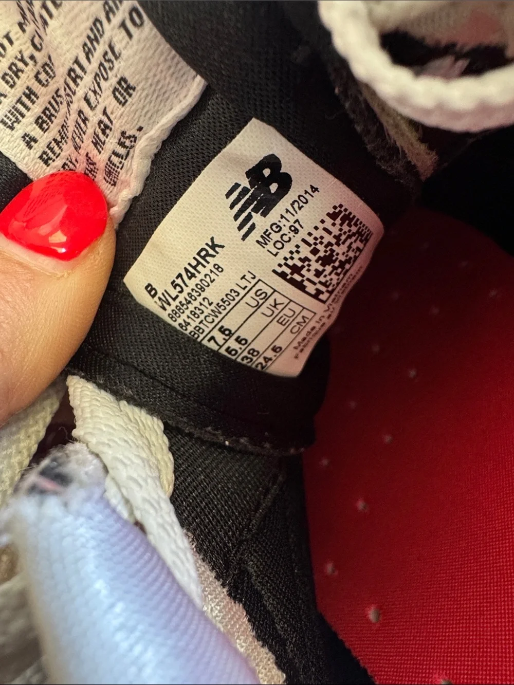 New Balance Black and White Sneakers with Pink Accents